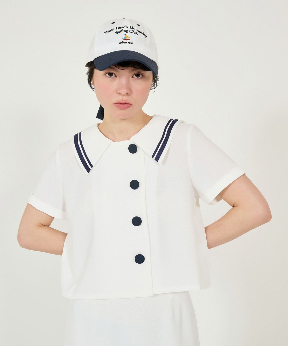 tina:jojunオフショル ナンバーTシャツ ホワイト TINA：JOJUN（ティーナジョジュン）の「オフショル ナンバーT