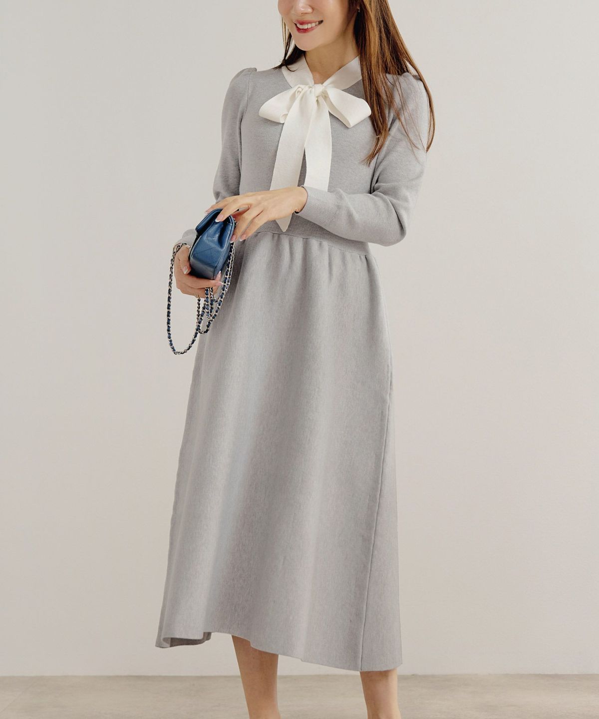 手洗い可ニットワンピース長袖ロングレディース秋春フレア黒可愛いオフィスきれいめジョイントスペース