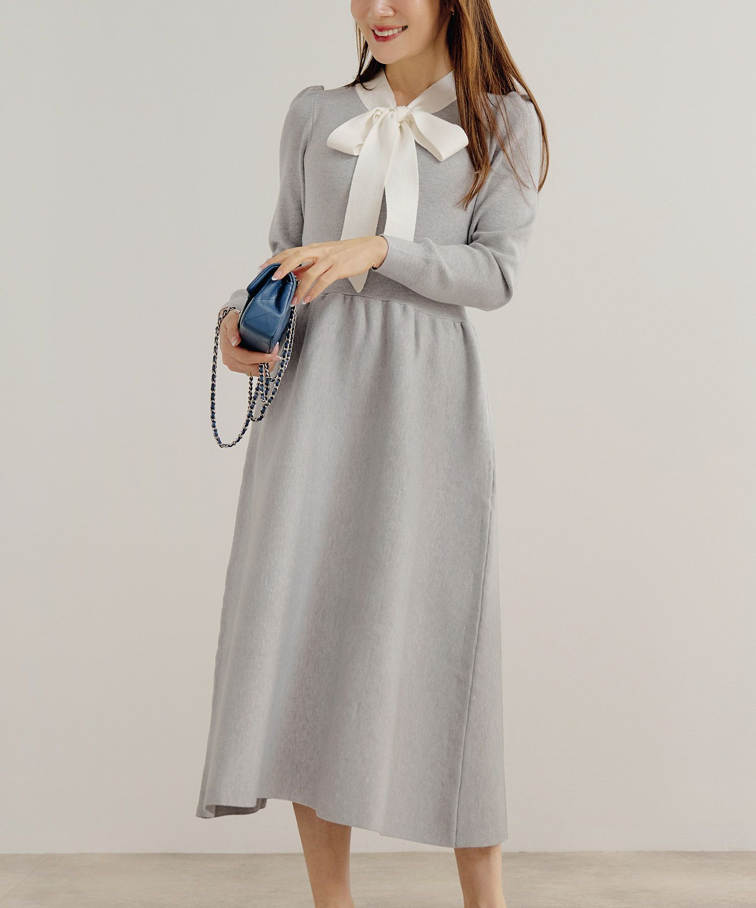 手洗い可ニットワンピース長袖ロングレディース秋春フレア黒可愛いオフィスきれいめジョイントスペース