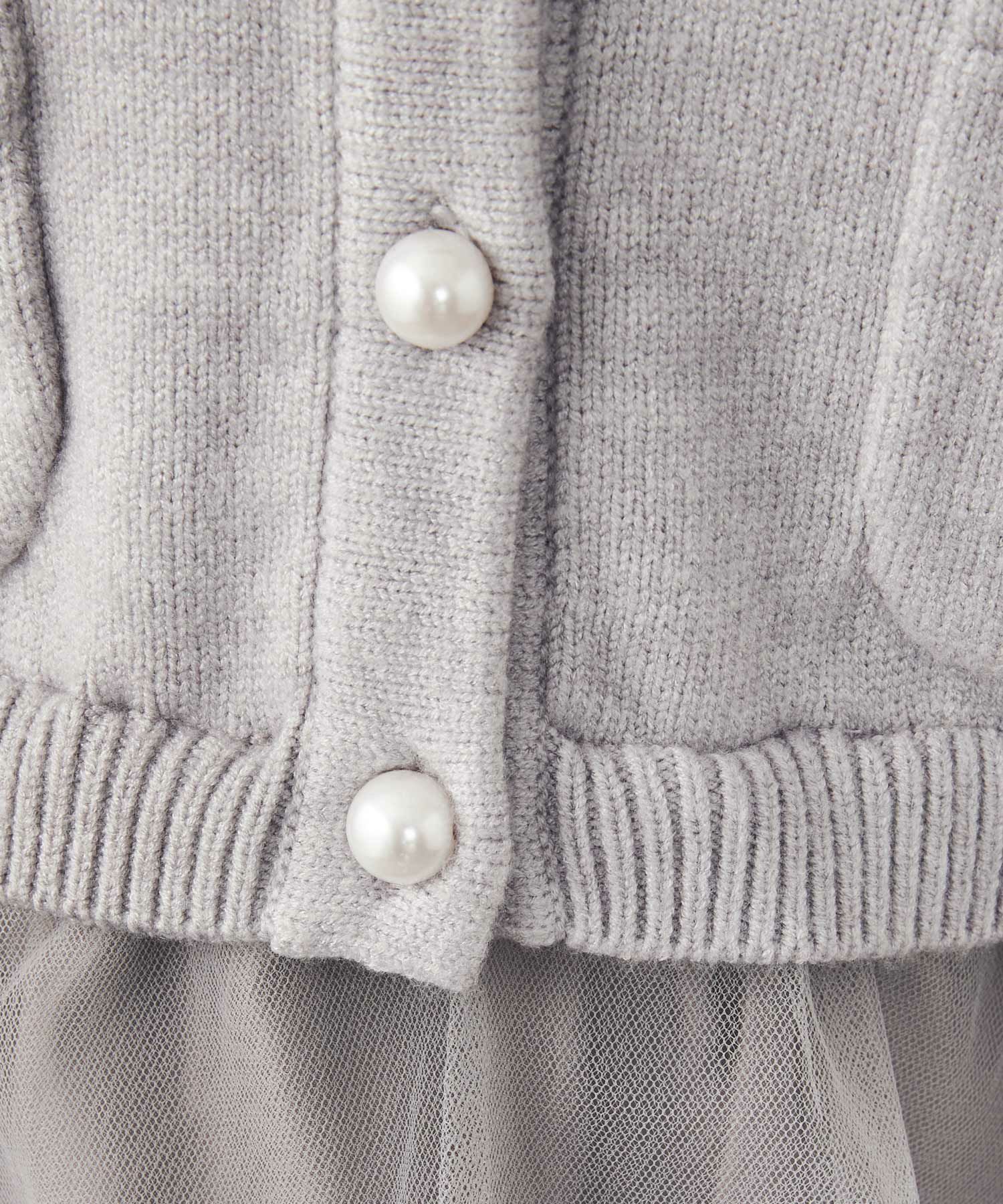 手洗い可レディーストップスニットかわいいきれいめオフィスチュール長袖黒おすすめジョイントスペース